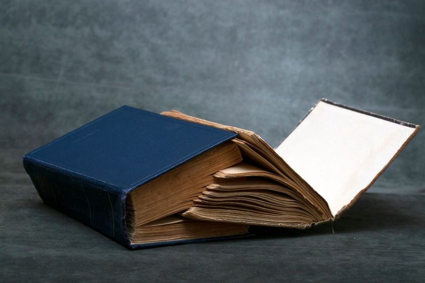 Book opened flat showing the hollow between the spine and the text block